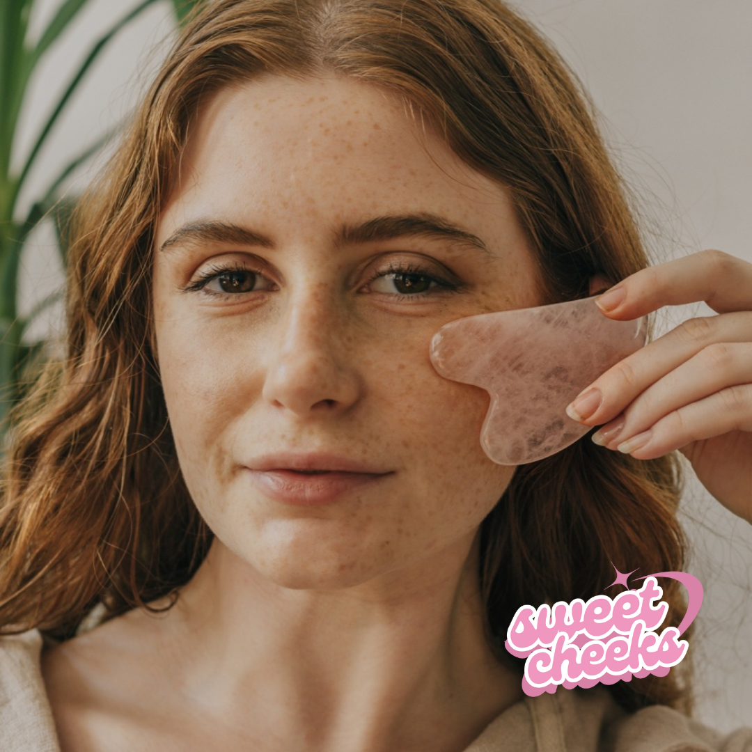 Rose Quartz Crystal Gua Sha with Black Skull Pouch - Sweet Cheeks