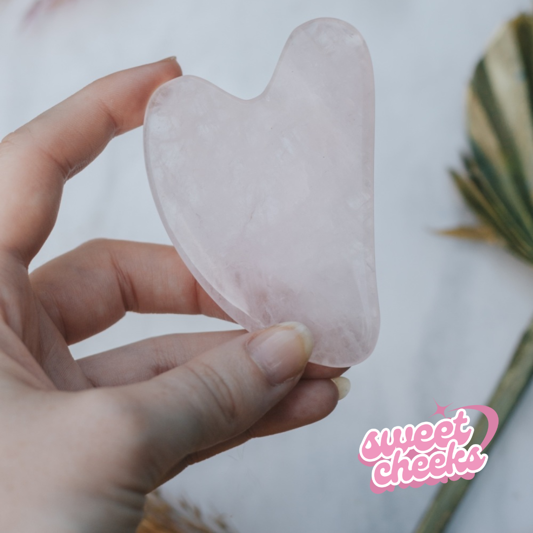 Rose Quartz Crystal Gua Sha with Black Skull Pouch - Sweet Cheeks